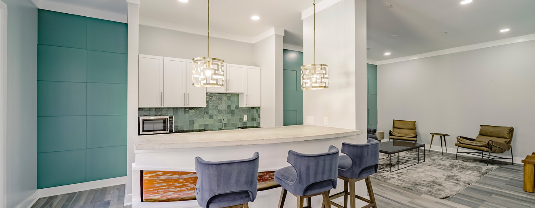 pendant lighting over serving counter in clubhouse kitchen